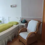 Quarto em Acomodações Particulares Li's Guestrooms